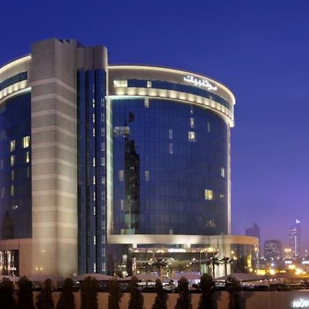 Moevenpick Hotel Al Khobar Luaran gambar The hotel at night